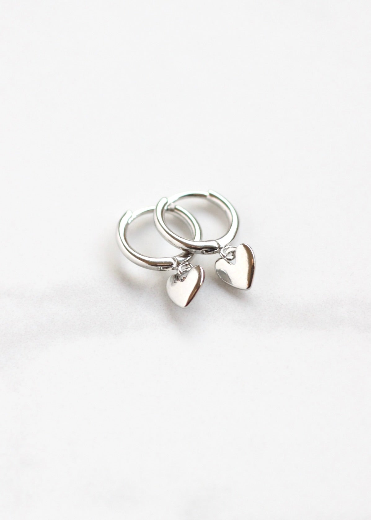 Perfect for everyday wear, these silver coloured small heart earrings are just fabulous and make a great gift